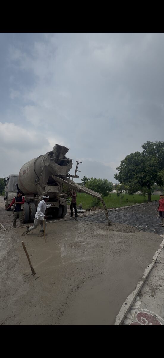 1100 ft road construction by Braj Builders, concrete pouring